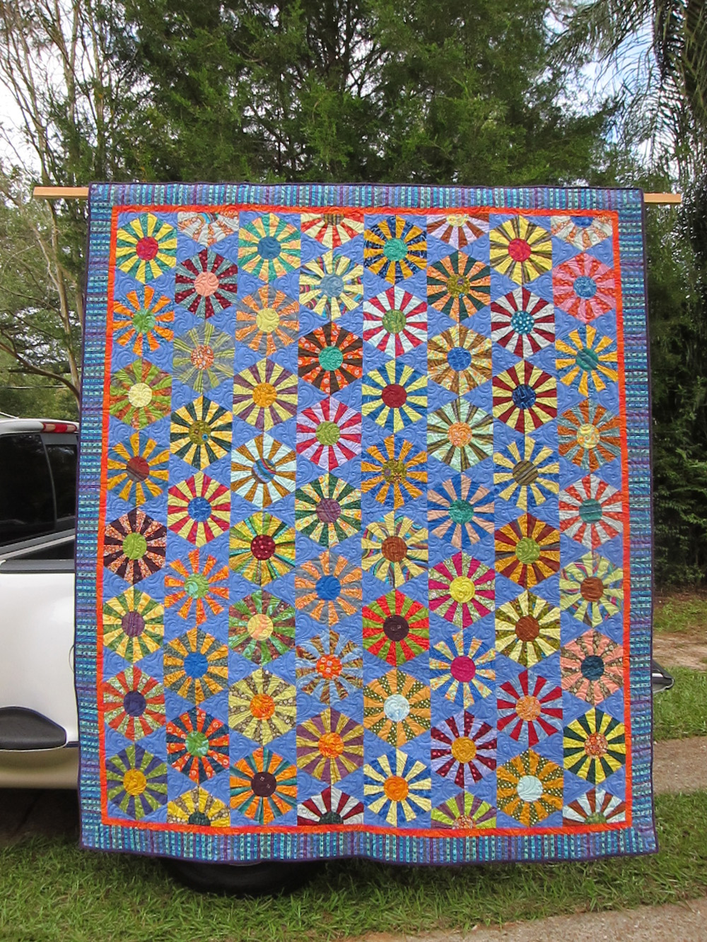 Jessica Duke, Dresden Hexagon Star, quilted by The Quilt Peddler